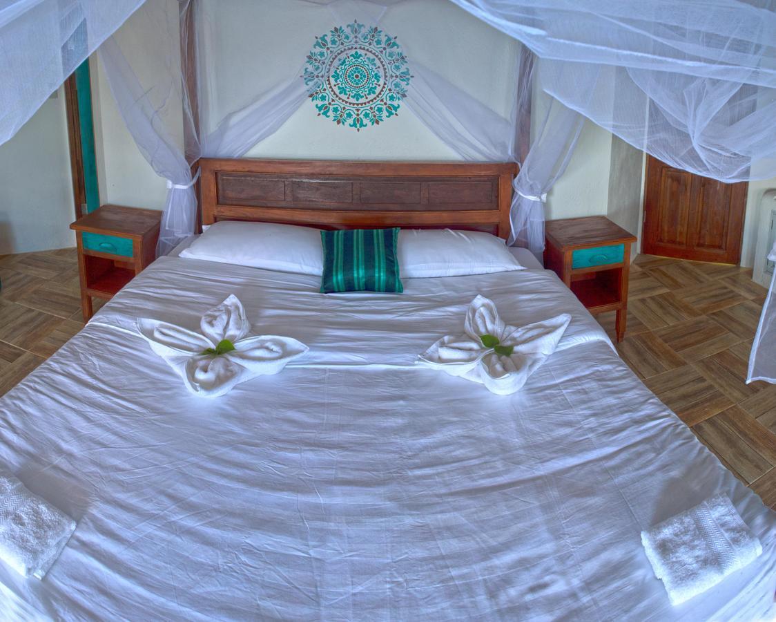 Iris Island Eco Resort บูซวงกา ภายนอก รูปภาพ